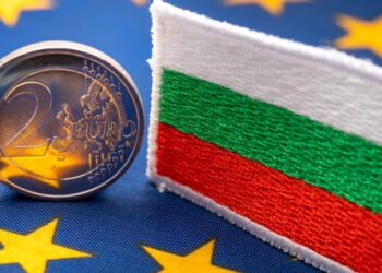The flag of Bulgaria against the background of the single currency of the European Union, The concept of Bulgaria joining the Euro zone,
economic and political background