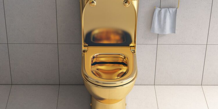 Golden toilet bowl in wc. 3d illustration
