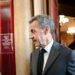 Former French President Nicolas Sarkozy leaves the courthouse after the ruling in his appeal trial in a corruption case at Paris courthouse on May 17, 2023.  A French court of appeals on May 17, 2023 upheld a prison sentence of three years, including two suspended, against former president Nicolas Sarkozy for corruption and influence peddling.
 (Photo by bERTRAND GUAY / AFP)