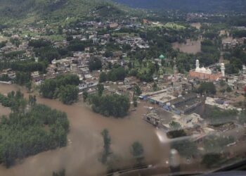 In this photo released by Provincial Disaster Management Authority, houses are submerged in floodwater following flash flooding due to heavy rains, in Buner district, in Pakistan's northwest, Friday, Aug. 15, 2025. (Provincial Disaster Management Authority via AP)
