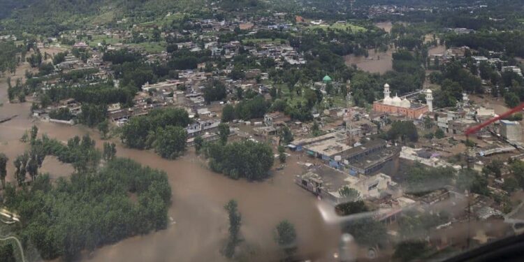 In this photo released by Provincial Disaster Management Authority, houses are submerged in floodwater following flash flooding due to heavy rains, in Buner district, in Pakistan's northwest, Friday, Aug. 15, 2025. (Provincial Disaster Management Authority via AP)