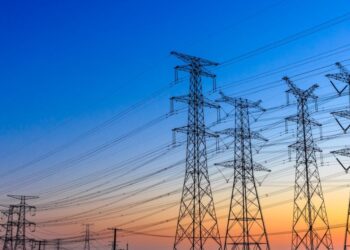 high voltage post,High voltage tower sky sunset background