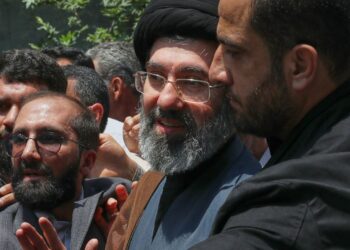 Mojtaba Khamenei, the son of Iran's Supreme Leader, Ayatollah Ali Khamenei, center, attends the annual Quds, or Jerusalem Day, rally in Tehran, Iran, May 31, 2019. (AP Photo/Vahid Salemi)