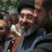 Mojtaba Khamenei, the son of Iran's Supreme Leader, Ayatollah Ali Khamenei, center, attends the annual Quds, or Jerusalem Day, rally in Tehran, Iran, May 31, 2019. (AP Photo/Vahid Salemi)
